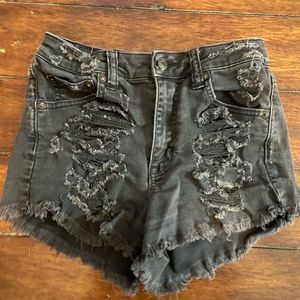 Ripped black denim shorts
